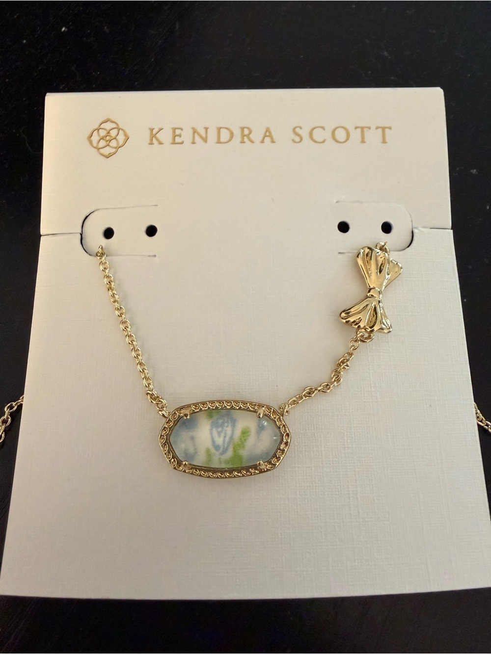 Kendra Scott Gold Necklace with Blue and Green Marbled Stone and Bow Accent